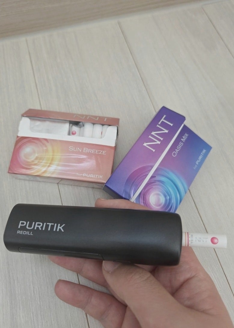 블랙 퓨리틱과 엔엔티 패키지 및 스틱을 든 실제 후기 사진
